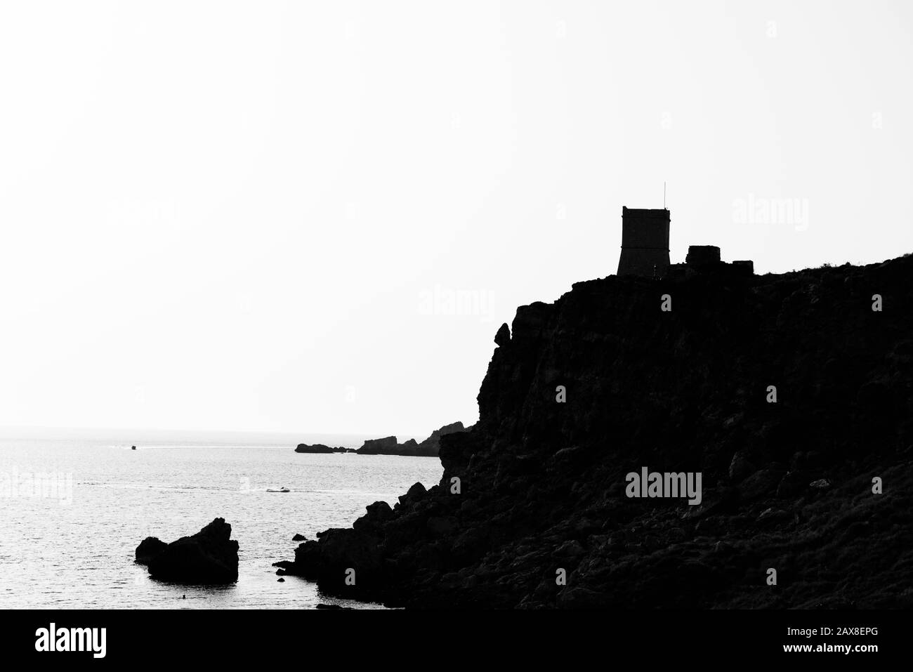 Black and white photo of the rock against the sun on Malta Stock Photo