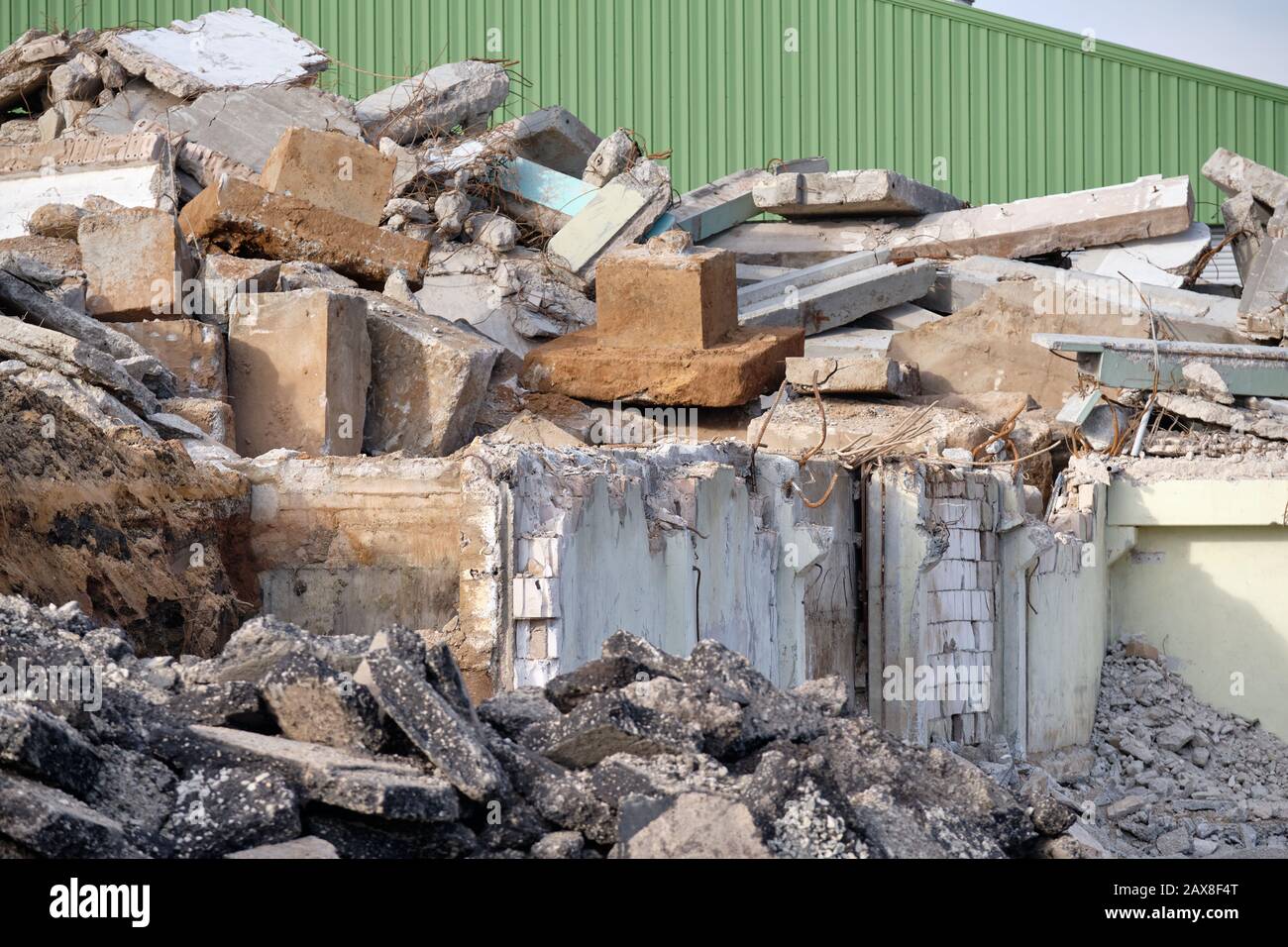 Close-up of demolitioned industrial building with the rubble lying everywhere on the construction site. Seen in Germany in February. Stock Photo