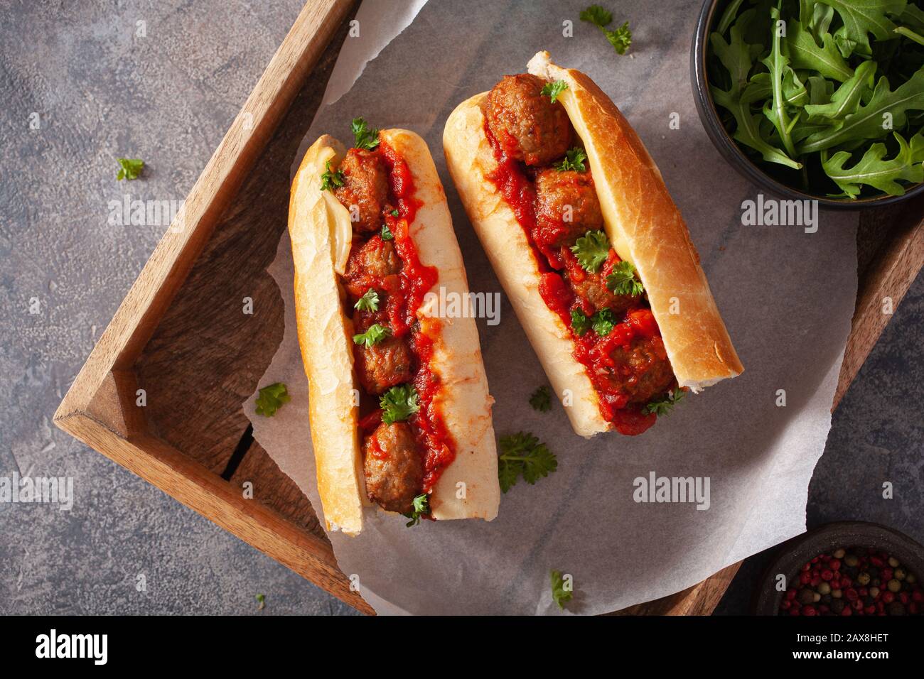 meatball sub sandwich with cheese and marinara tomato sauce. american