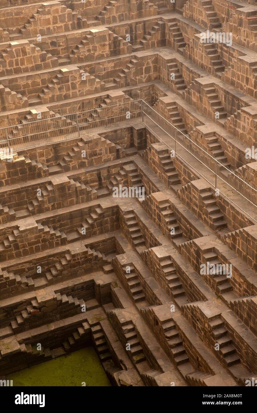 India, Rajasthan, Abhaneri, Chand Baori Stepwell, 13 stories of tiered steps down 30 metres to water Stock Photo