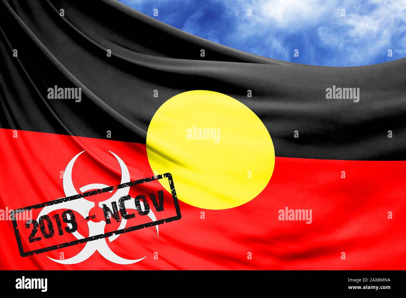 Novel coronavirus disease named 2019-nCoV with Australian Aboriginal flag closeup on blue sky background Stock Photo