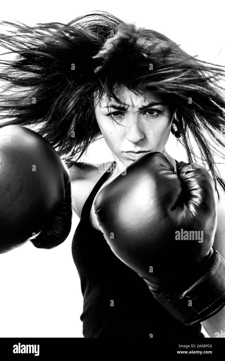 girl with boxing gloves in defiant pose Stock Photo Alamy