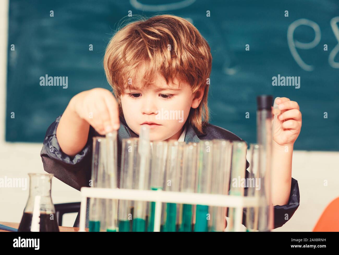 Chemical analysis. Science concept. Wunderkind experimenting with