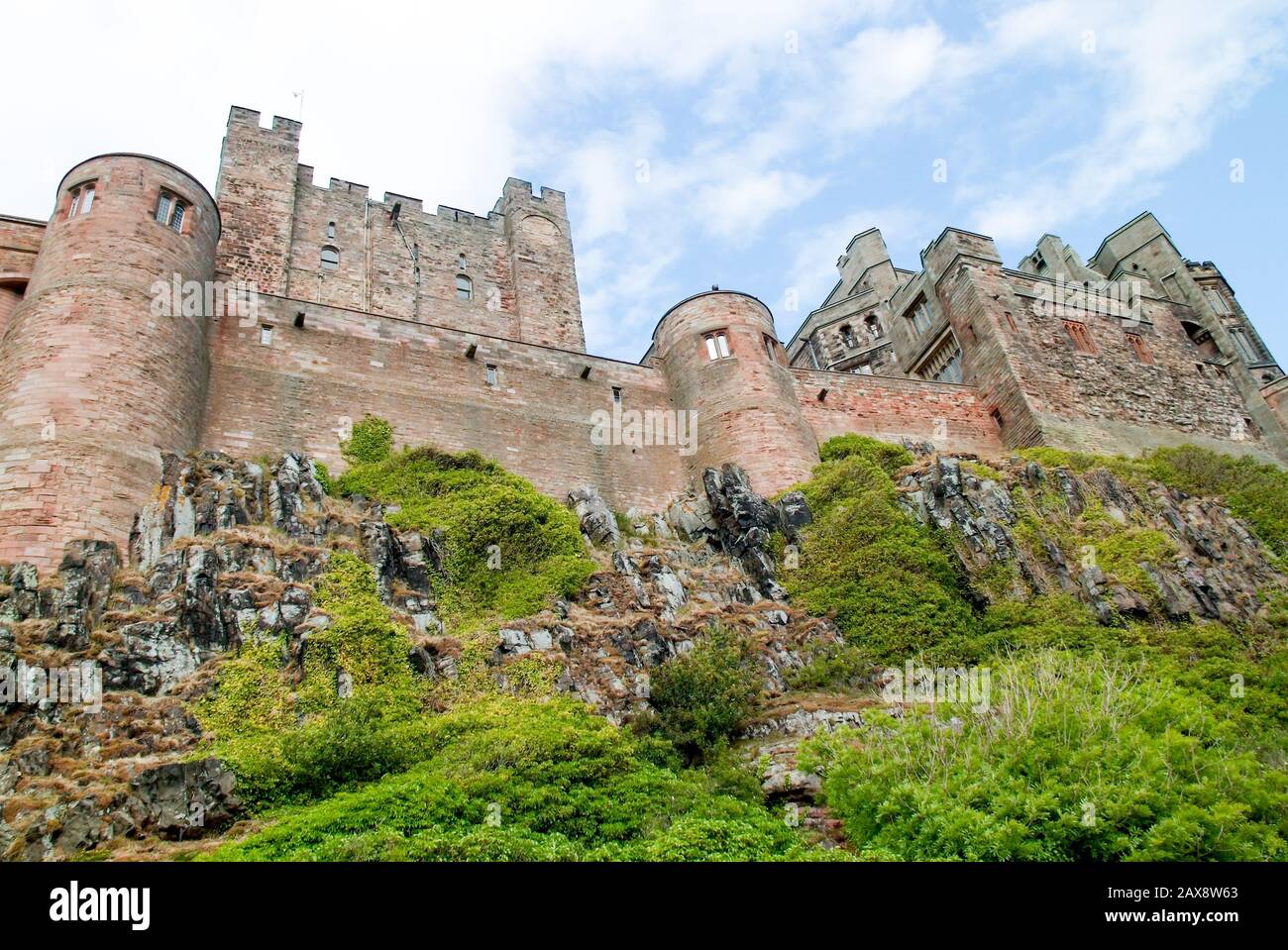 Bamburgh Castle an historical castle location in the north of england dating back to abglo-saxon era Stock Photo