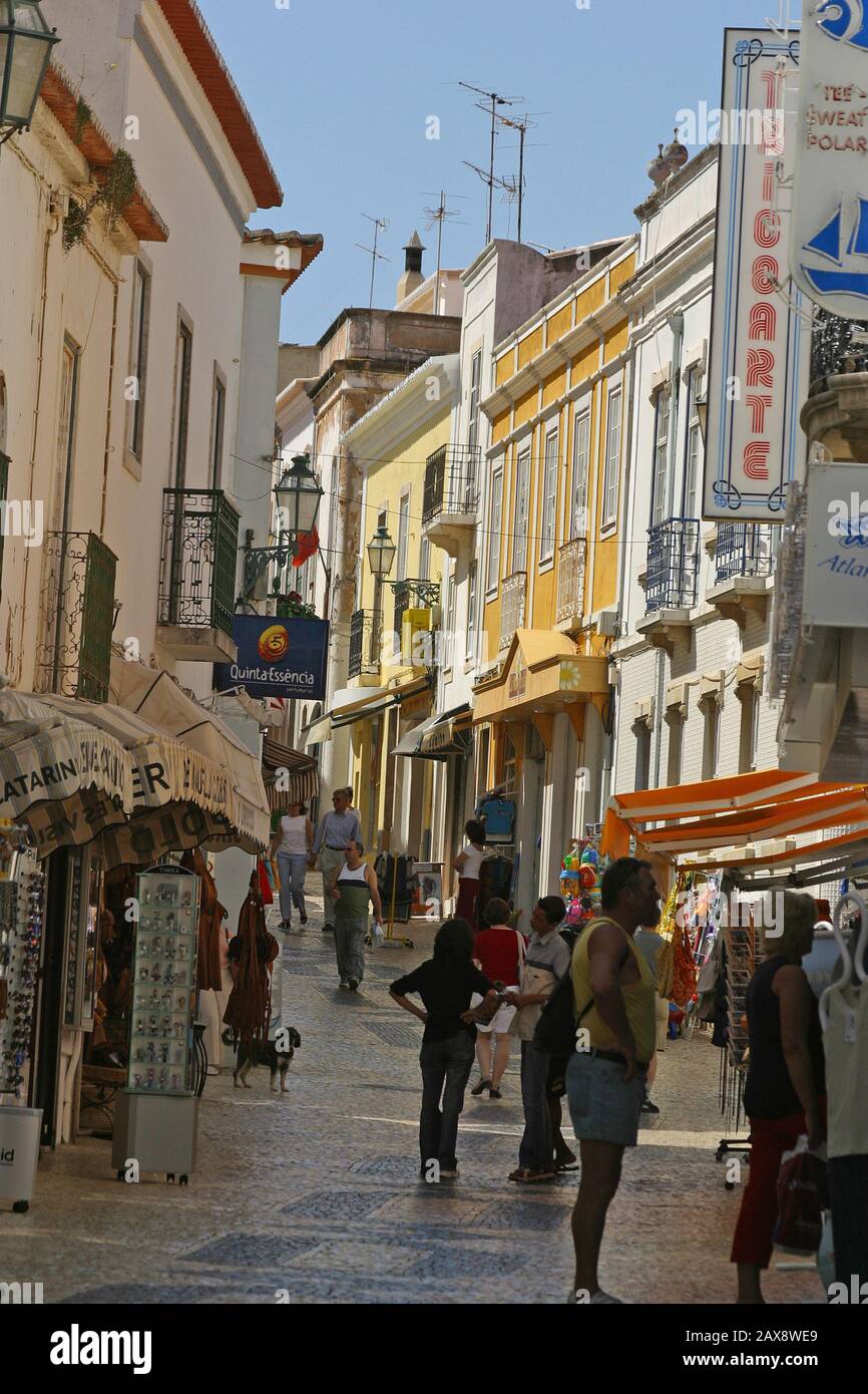Tourists shopping on the shopping street in Lagos old town Stock Photo