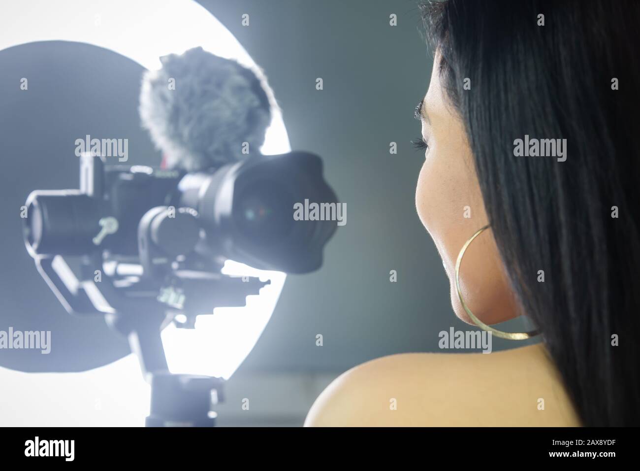 Female vlogger doing a video. Stock Photo