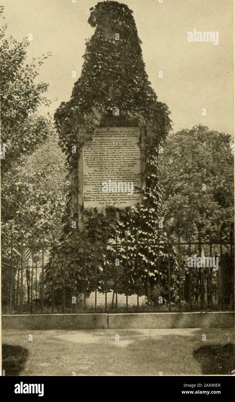 In and about historic Boston . MINUTE MAN STATUE. LEXINGTON.The approach to Lexinfiton Green from Boston is marked by a splendid statue,by Kitson. of Captain Parker, the sturty patriot who led the Lexington farmersin the struggle of April 19th. The British forces numbered eight hundred menunder command of Lieutenant-Colonel Francis Smith, of the 10th Regiment, andMajor John Pitcairn, commander of a battalion of marines. REVOLUTIONARY MONUMENT. LEXINGTON.This vine-clad monument stands on the west side of Lexington Green. Theinscription tells that it was erected as a tribute to the memory of Ens Stock Photo