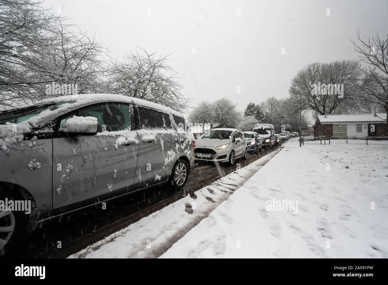 Heavy traffic on Anchor road due to a sudden snow blizzard in Stoke on