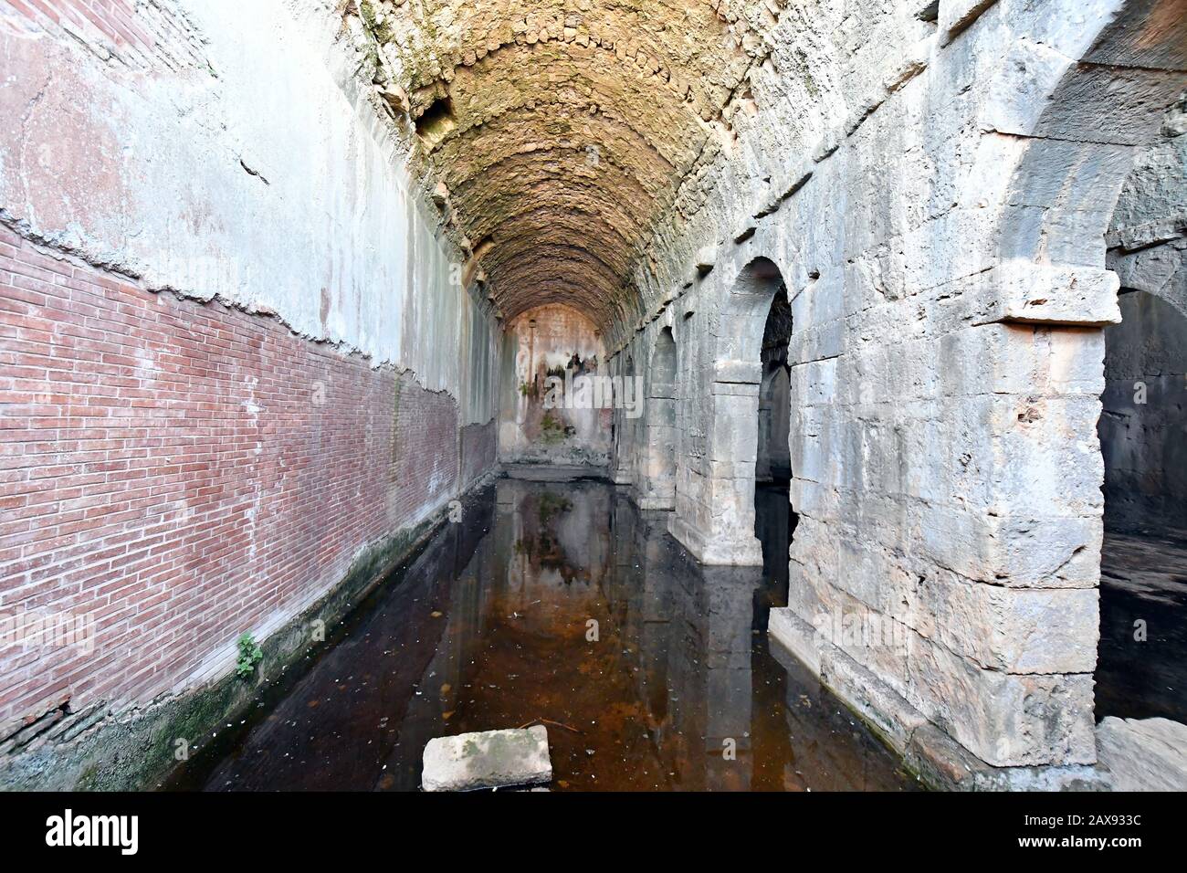 Greece, ancient Roman cistern at archaelogical site of Minoan ruins of ...