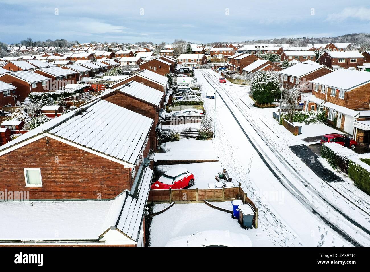 Aerial landscapes of Longton, Stoke on Trent covered in snow after a sudden storm came in. Heavy snowfall and snowy blizzards covering the city Stock Photo