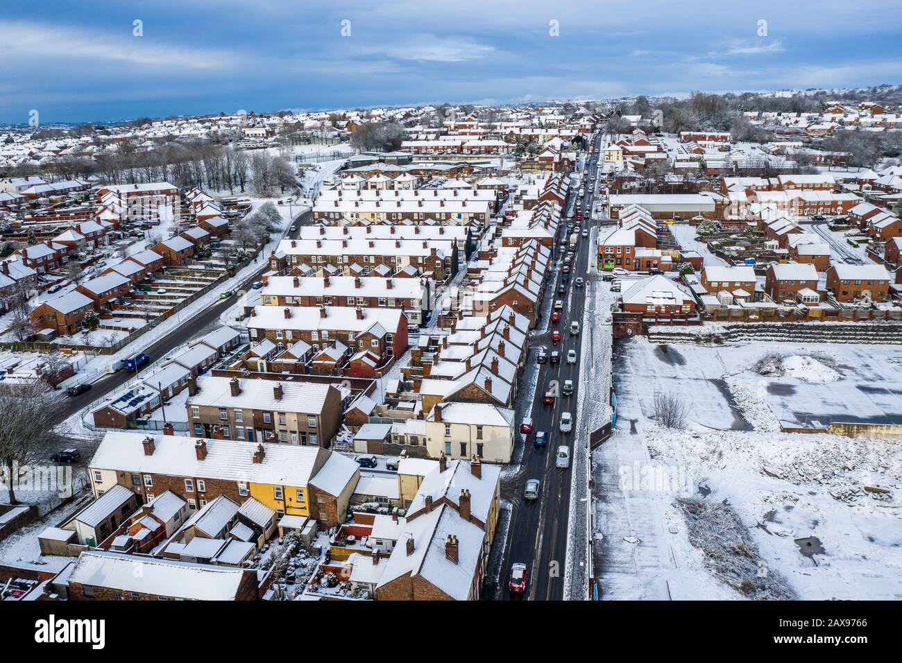 Aerial view heavy traffic on Anchor road, after a sudden snow blizzard in Stoke on Trent, dangerous driving conditions, cars travelling slowly, safely Stock Photo