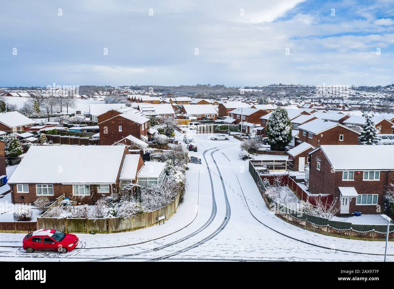 Aerial landscapes of Longton, Stoke on Trent covered in snow after a sudden storm came in. Heavy snowfall and snowy blizzards covering the city Stock Photo