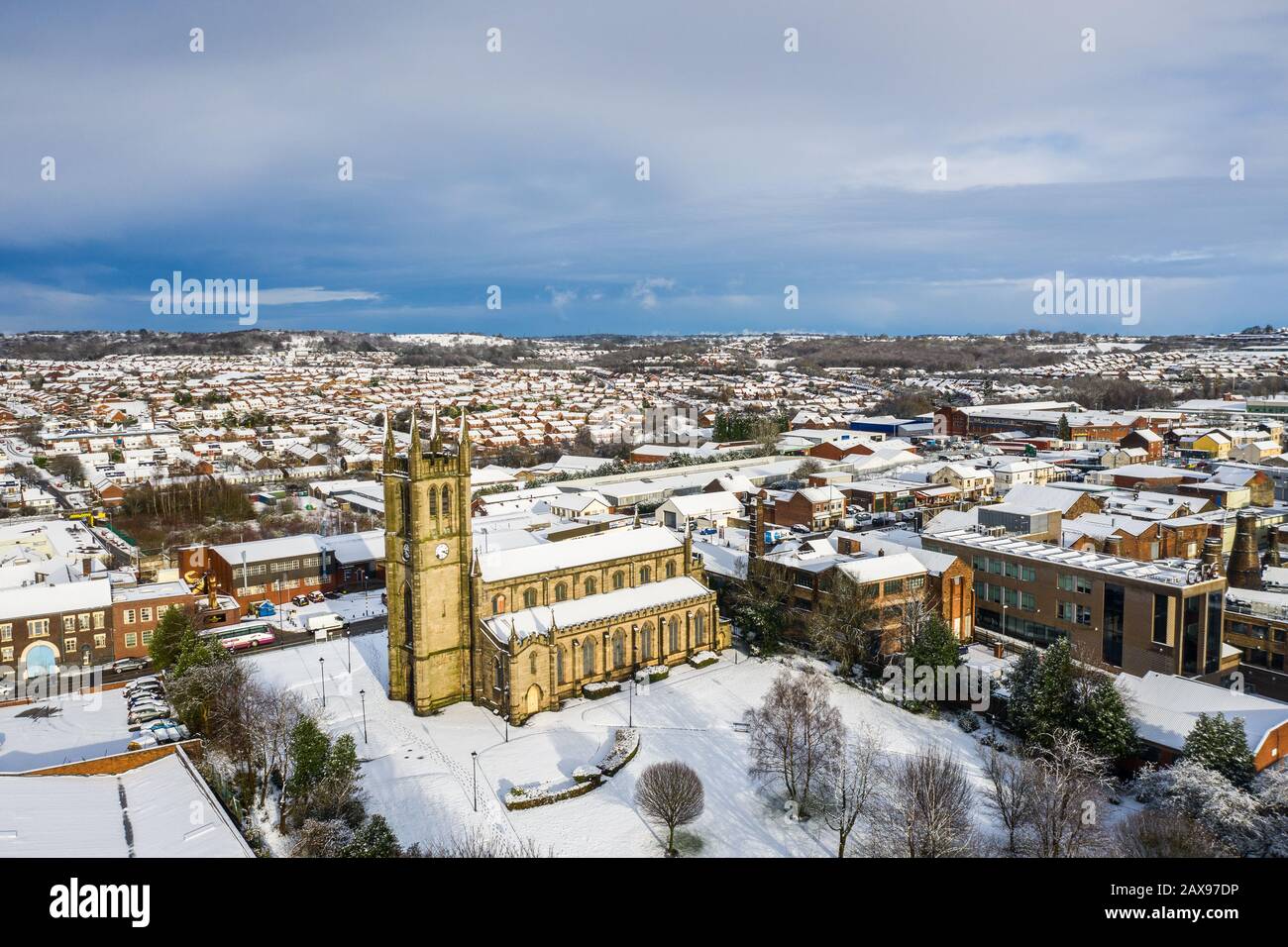 Aerial view of St Jame's church in snow in the midlands, Christian, Roman catholic religious orthodox building in a mainly muslim area of Stoke, Stock Photo