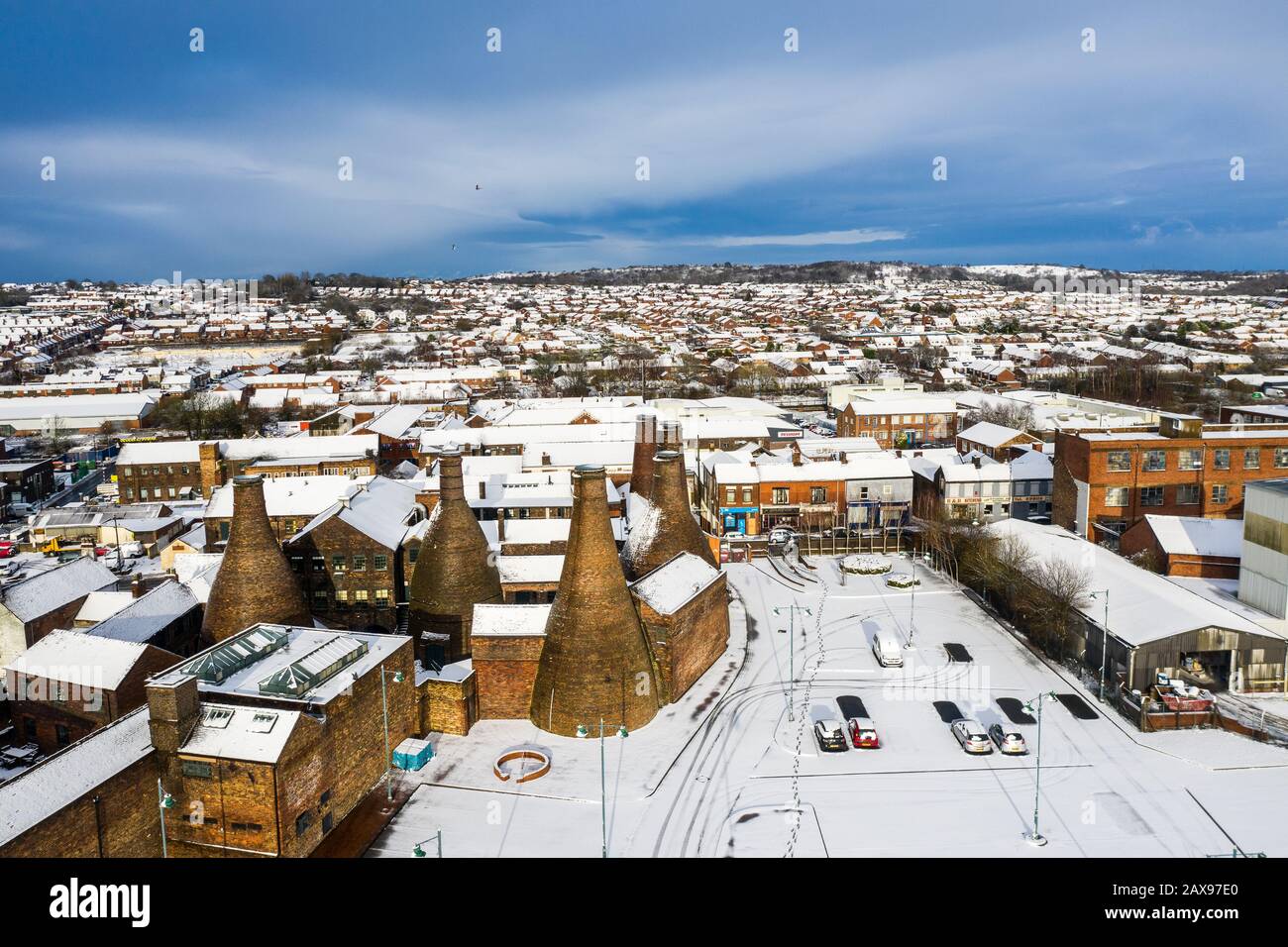 Aerial view of bottle kilns at Gladstone Pottery Museum, covered in snow on a cold winter day, Pottery manufacturing, snow in Stoke on Trent Stock Photo
