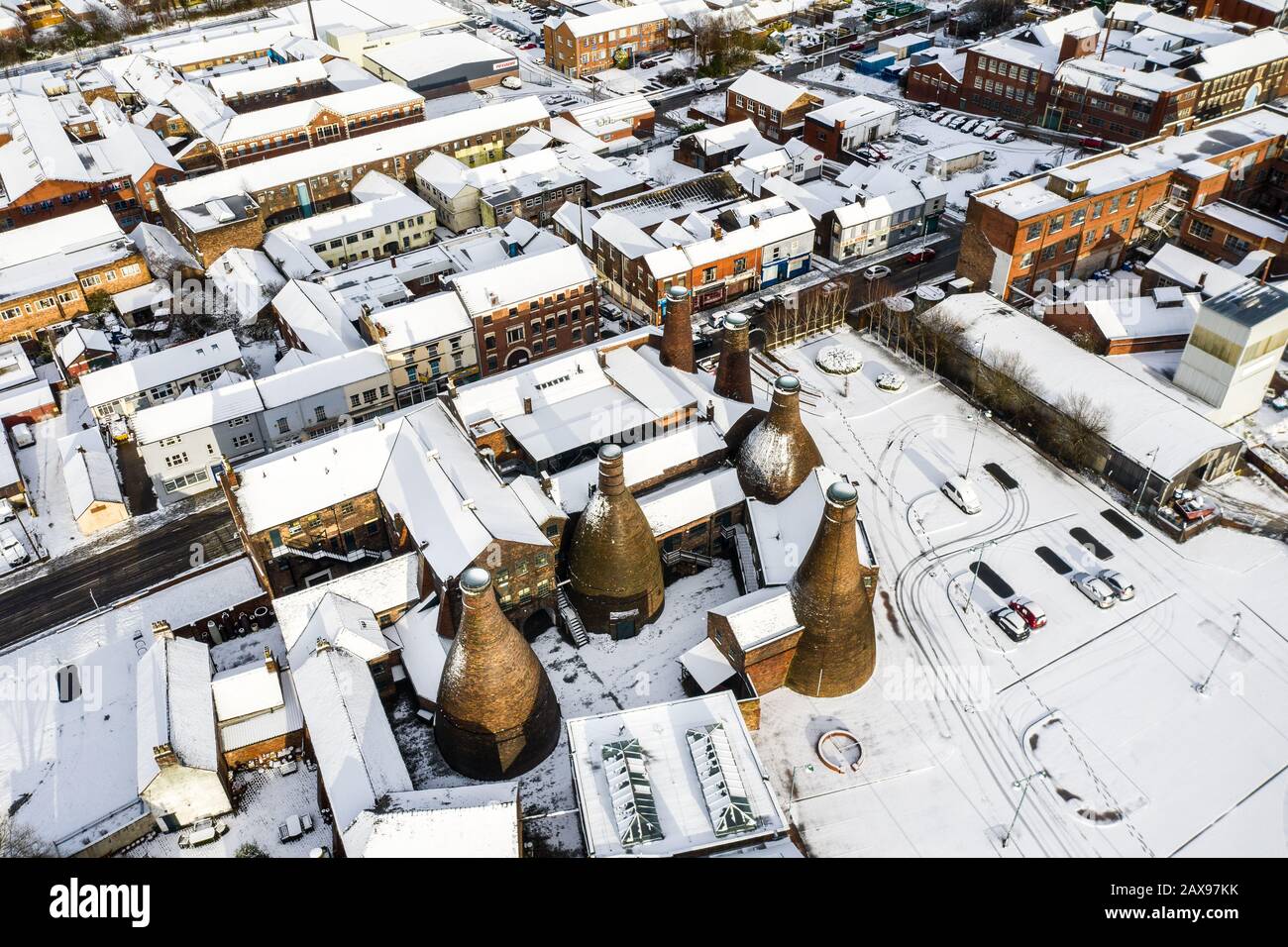 Aerial view of bottle kilns at Gladstone Pottery Museum, covered in snow on a cold winter day, Pottery manufacturing, snow in Stoke on Trent Stock Photo