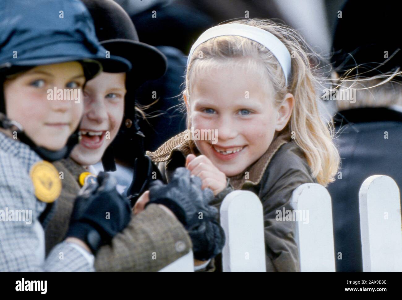 Zara Phillips shares a joke with her friends at Windsor Horse Trials, Windsor, England May 1988 Stock Photo