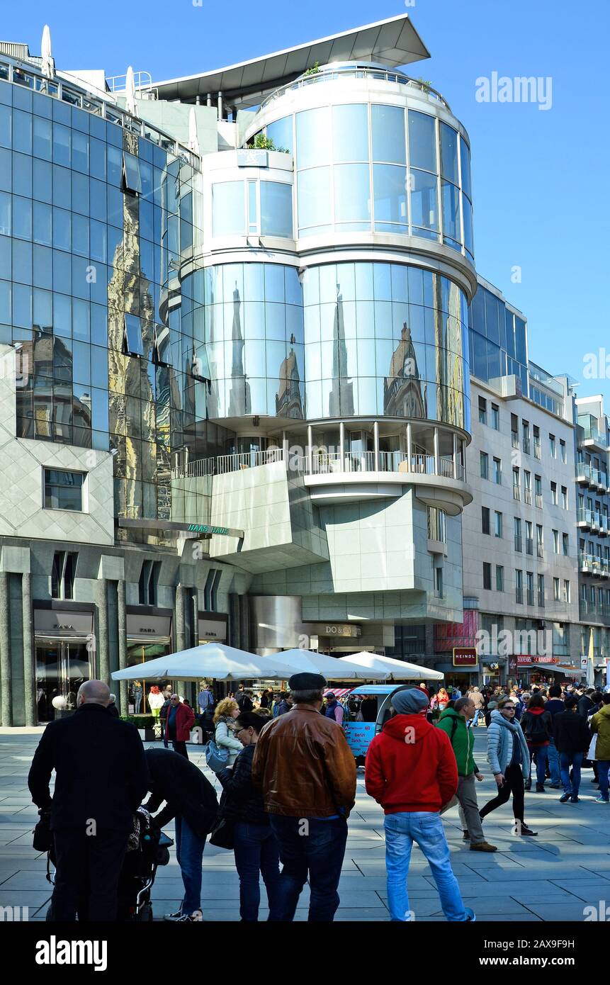 Vienna, Austria - March 27th 2016: Unidentified people on Stephansplatz with Haas Hausl and different builings in centrum of the city Stock Photo
