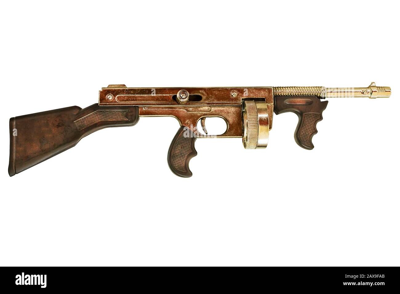 Vintage gold coloured machine gun isolated on a white background Stock ...