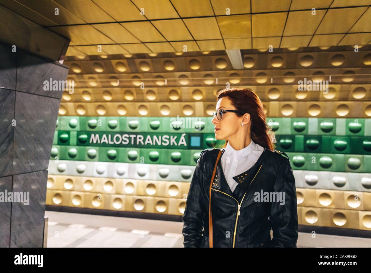 Woman in metro in Prague Stock Photo