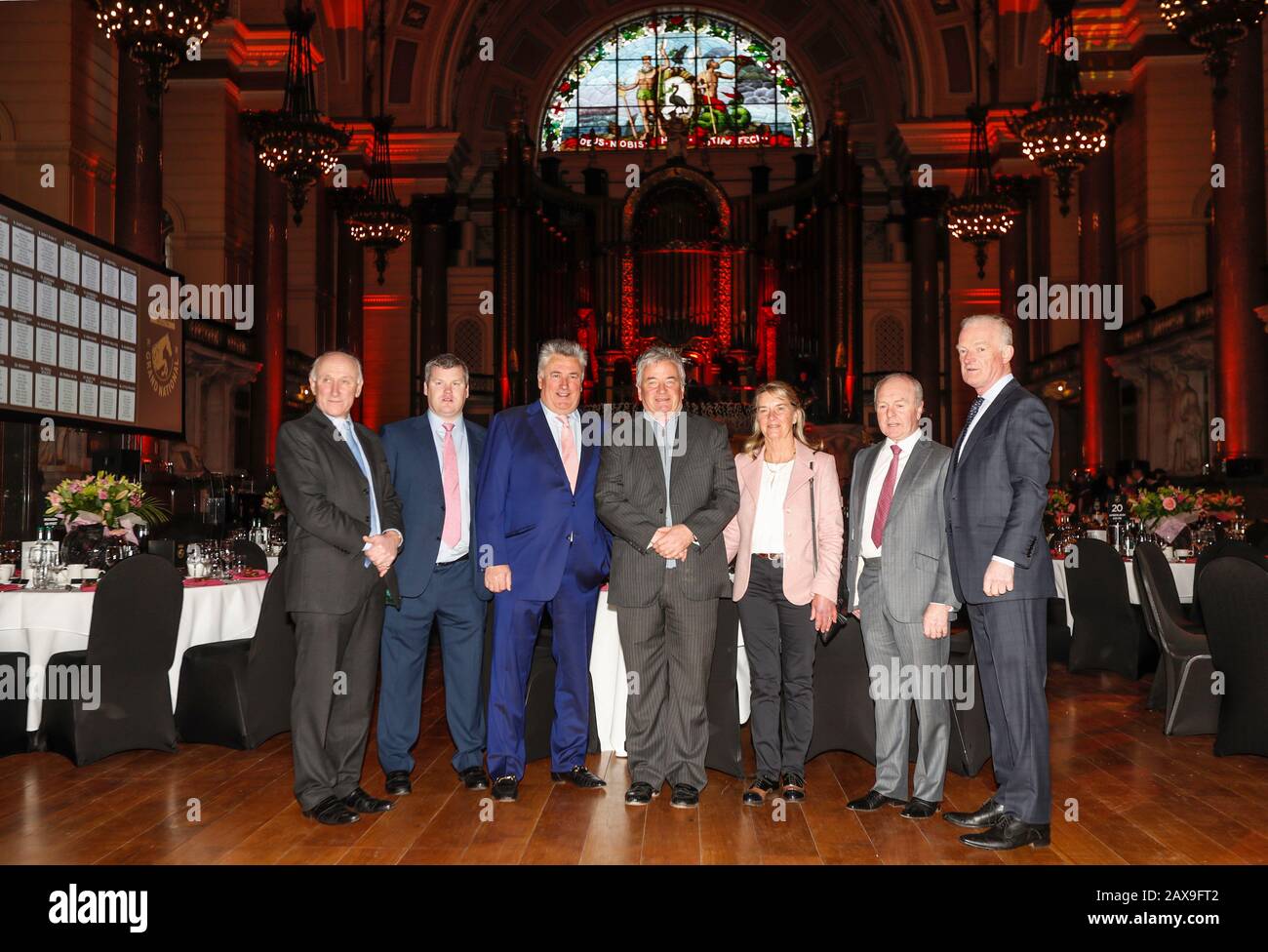Trainers (from left to right) Oliver Sherwood, Gordon Elliott, Paul Nicholls, Nigel Twiston-Davies, Sue Smith, Jonjo O'Neill and Willie Mullins during the Grand National weights lunch at St George's Hall, Liverpool. Stock Photo