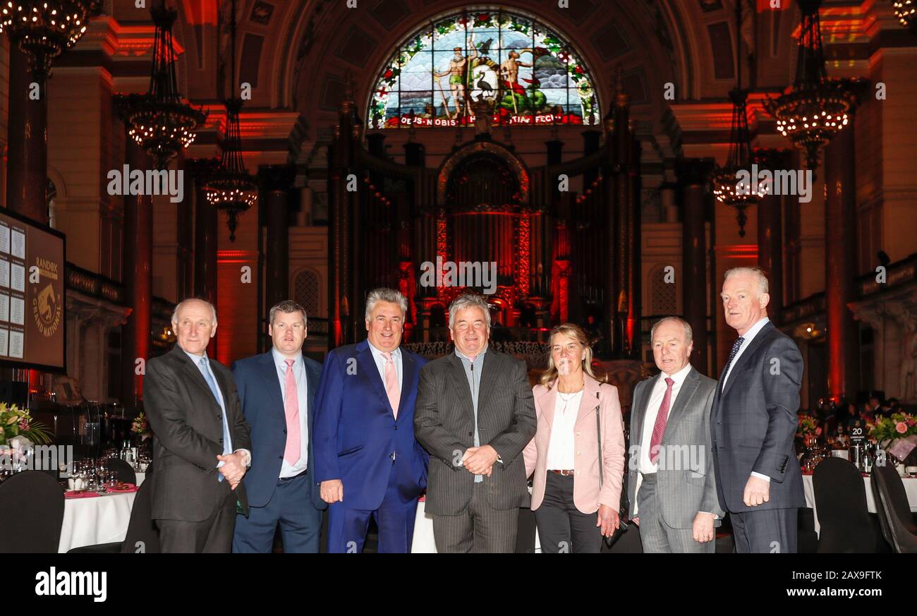 Trainers (from left to right) Oliver Sherwood, Gordon Elliott, Paul Nicholls, Nigel Twiston-Davies, Sue Smith, Jonjo O'Neill and Willie Mullins during the Grand National weights lunch at St George's Hall, Liverpool. Stock Photo