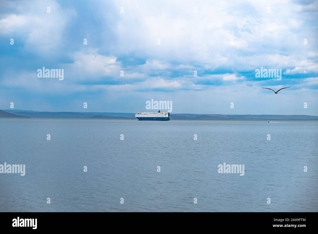 Roadstead Ship on the roadstead in the Amur Bay Stock Photo - Alamy