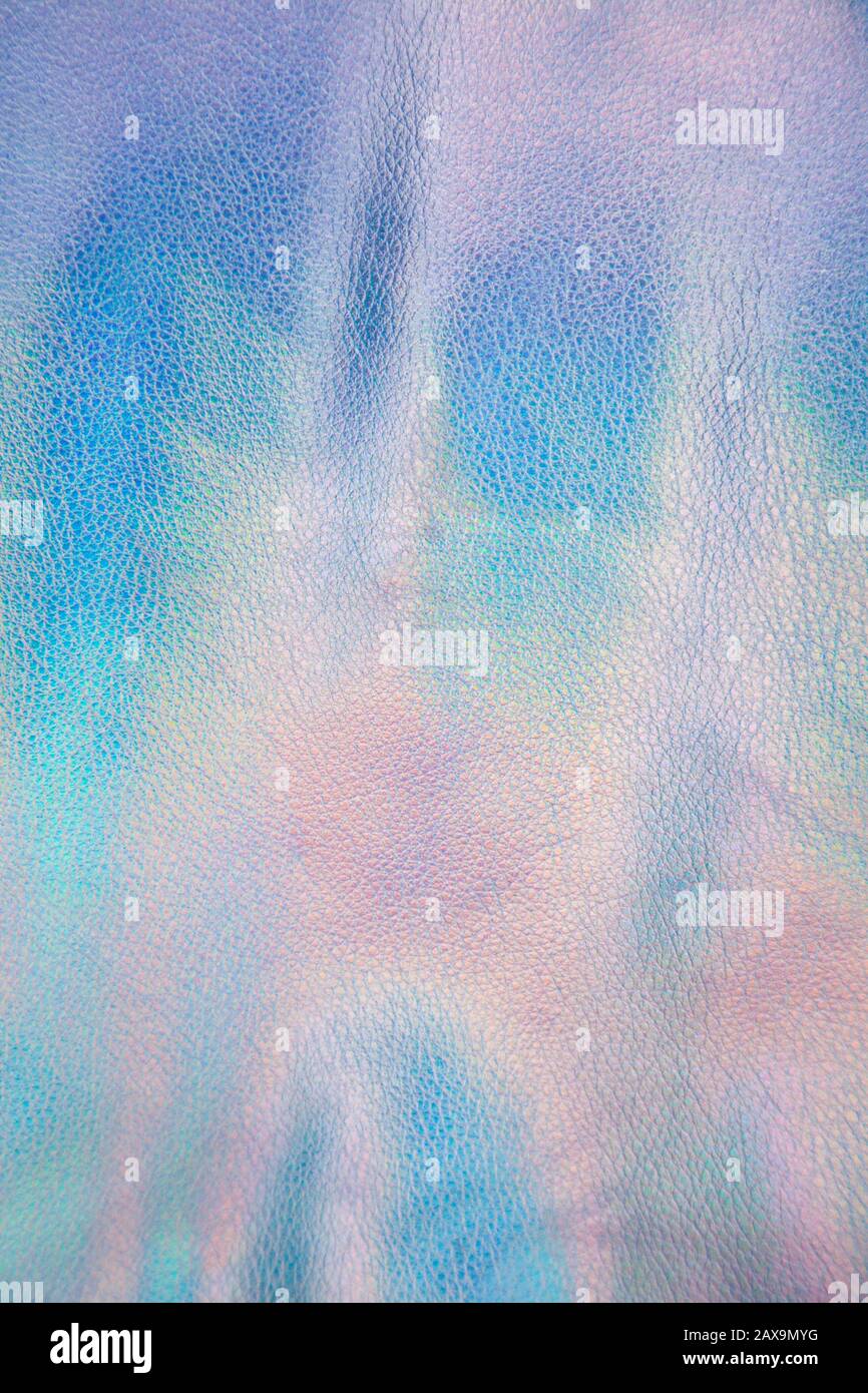 Colored shiny festive background from artificial leather. Holidays Christmas backdrop. Stock Photo