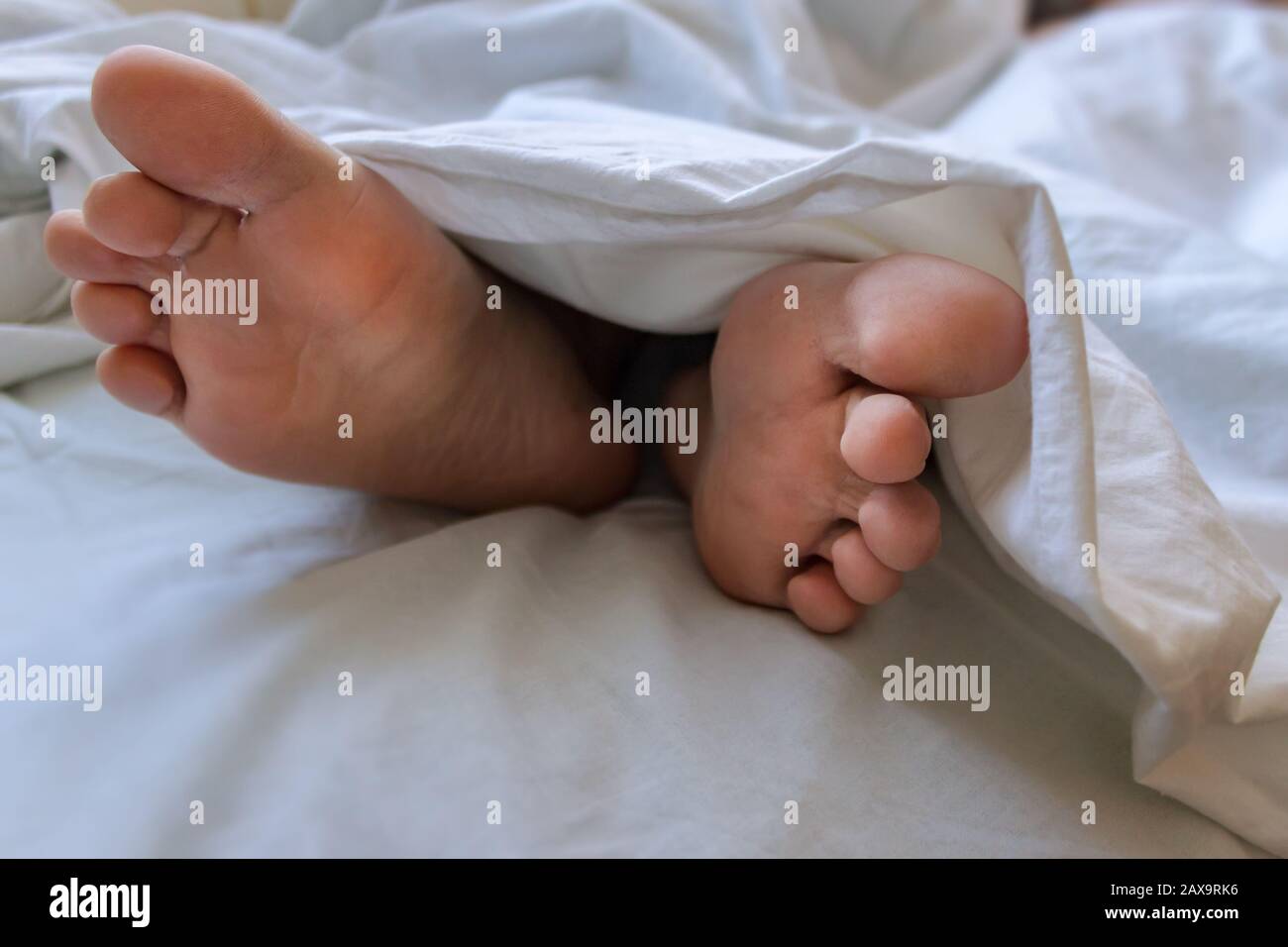 Feet bed night hires stock photography and images Alamy