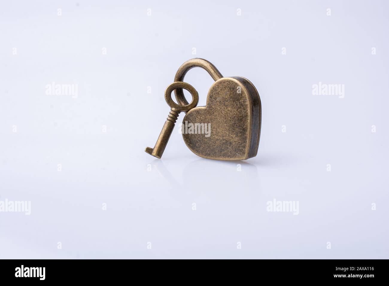 Metal padlock in heart shape as symbol of love Stock Photo - Alamy