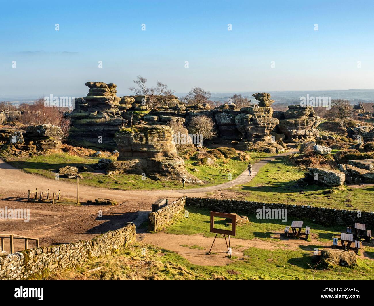 View from the visitor centre of gritstone rock formations at Brimham Rocks Brimham Moor Nidderdale AONB North Yorkshire England Stock Photo