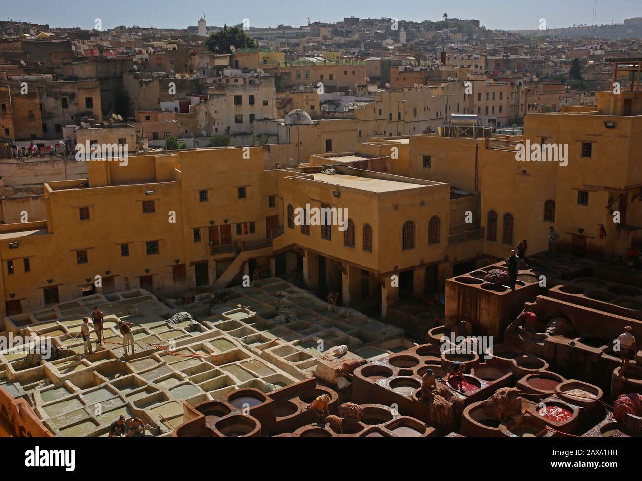 Workers are pictured in the Chouara Tannery in Fez, Morocco Stock Photo