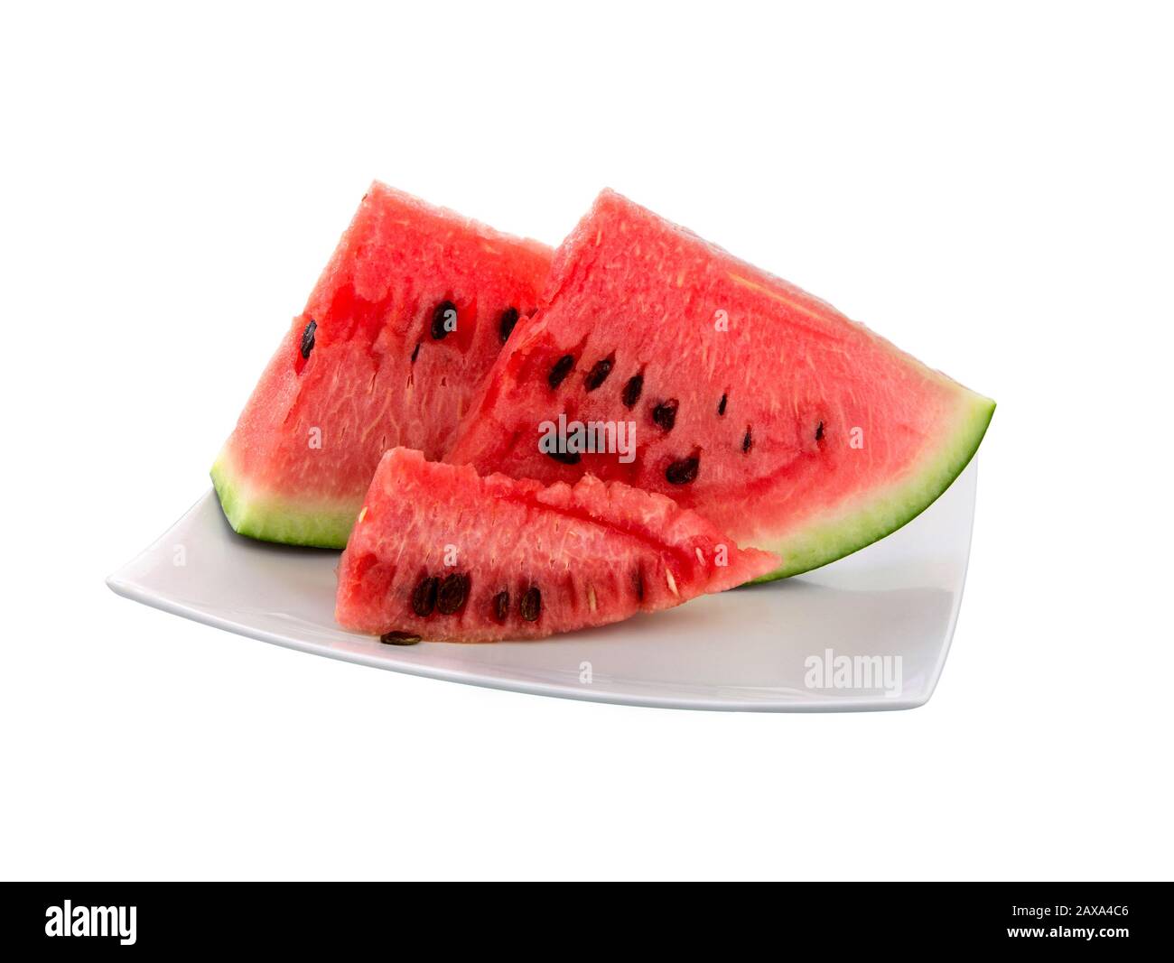 Watermelon slices on a plate in summer time. Slice of watermelon isolated on white background. Stock Photo