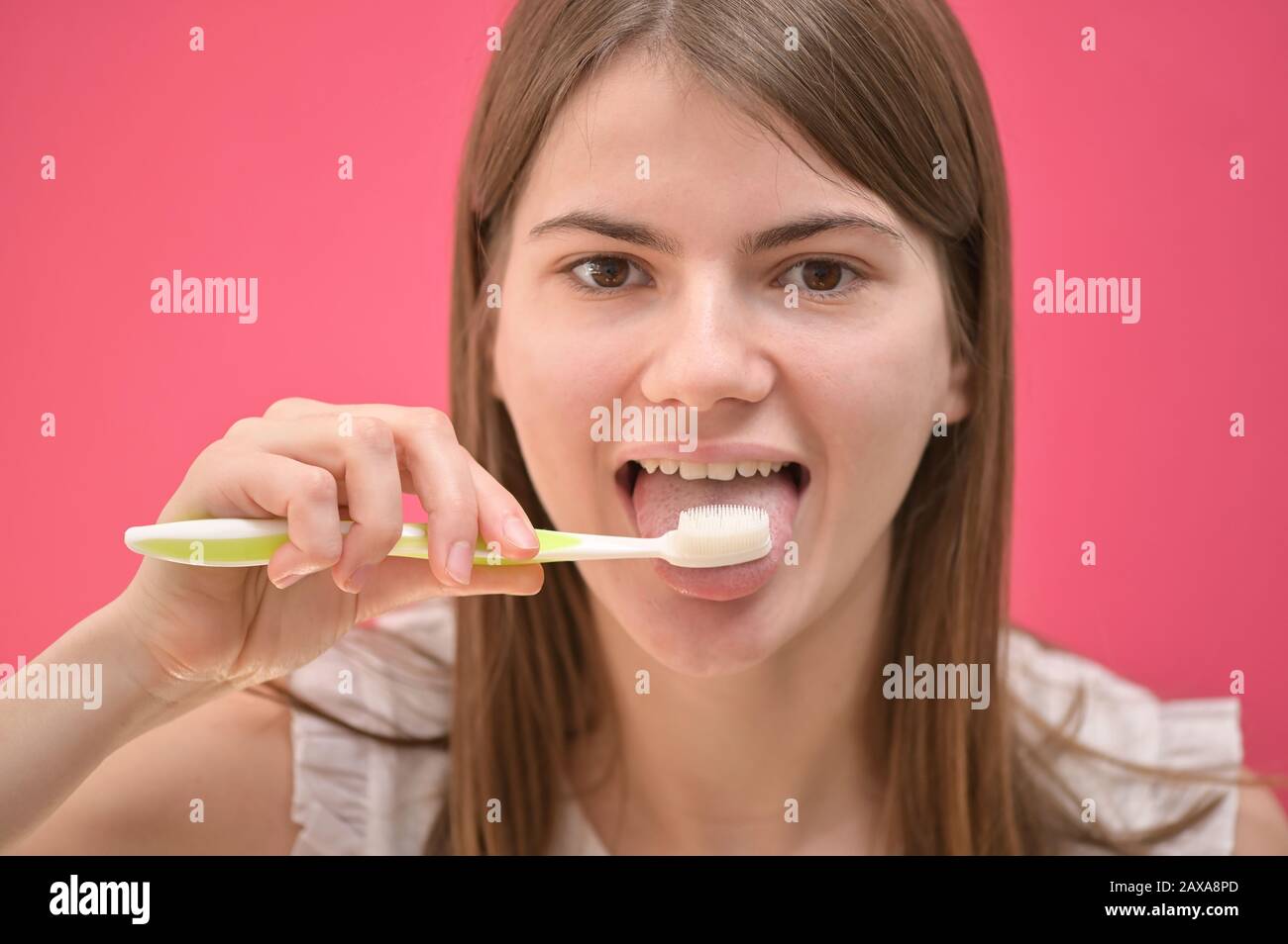 Clean teeth woman tongue hires stock photography and images Alamy