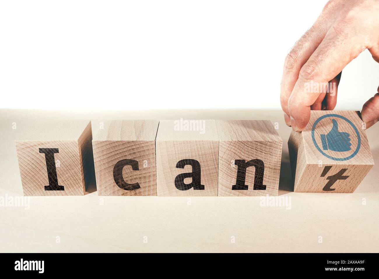 changing text I can not to I can on wooden blocks, motivation concept Stock Photo