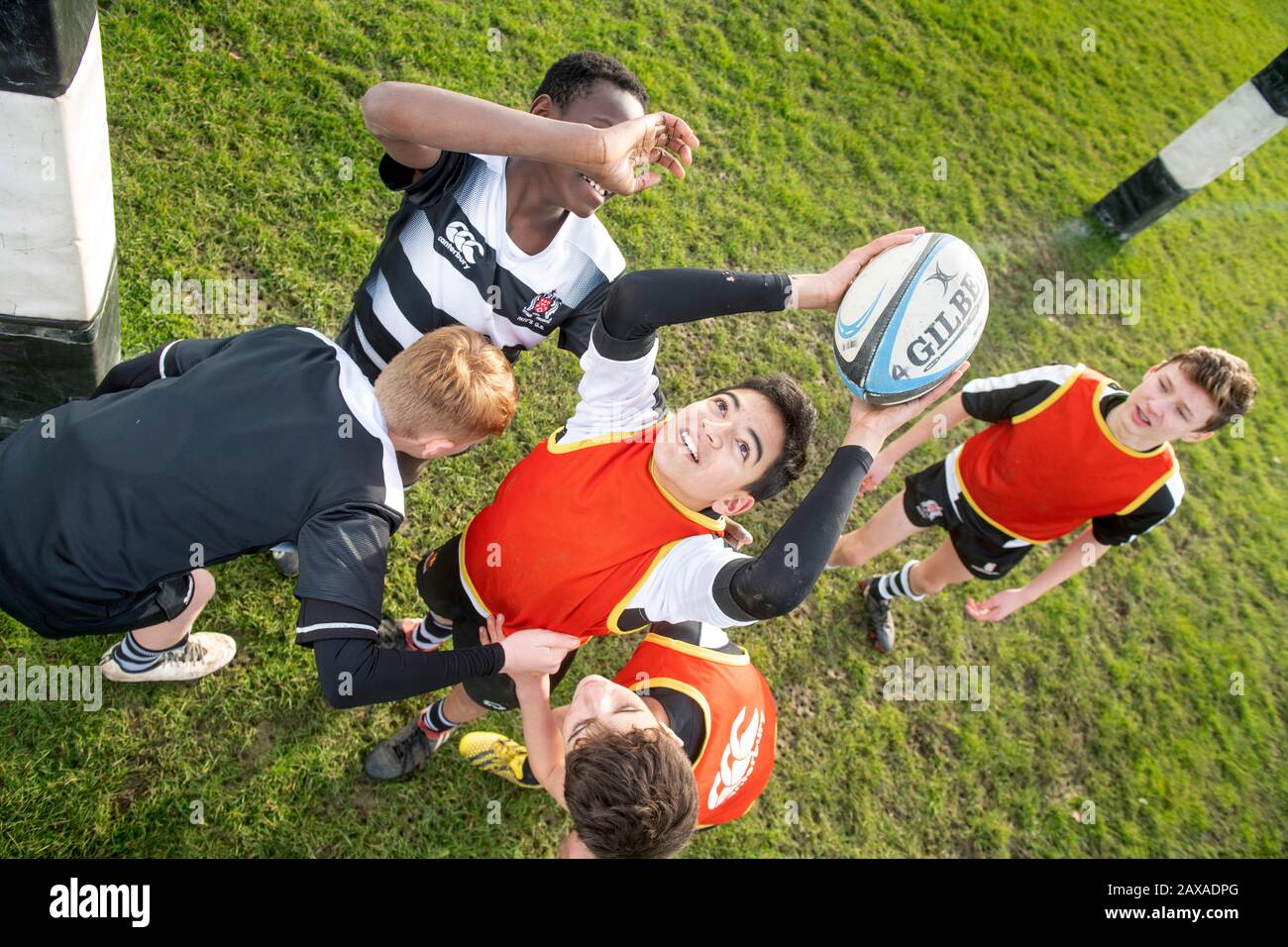 Thirteen year old boys playing rugby at a secondary school, UK Stock Photo