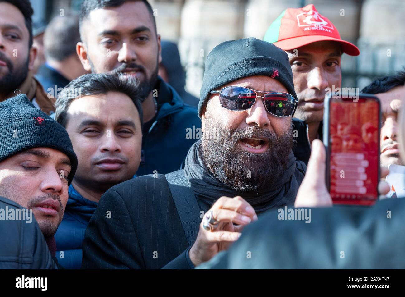 London, UK. 11th Feb, 2020. Members of the Bangladesh Nationalist Party attend a large and noisy protest opposite the Houses of Parliament to protest against the alleged illegal detention of party leaders in Bangladesh Credit: Ian Davidson/Alamy Live News Stock Photo