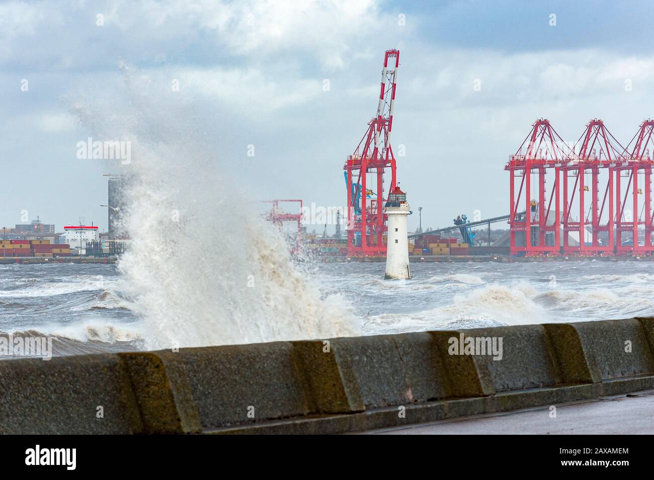 New Brighton, Wirral, UK. 11th February 2020. Strong waves in the aftermath of Storm Ciara continues to hit New Brighton, on the Wirral peninsula.  With strong gale force winds and flooding, the cleanup operation now begins.  Credit: Paul Warburton/Alamy Live News Stock Photo