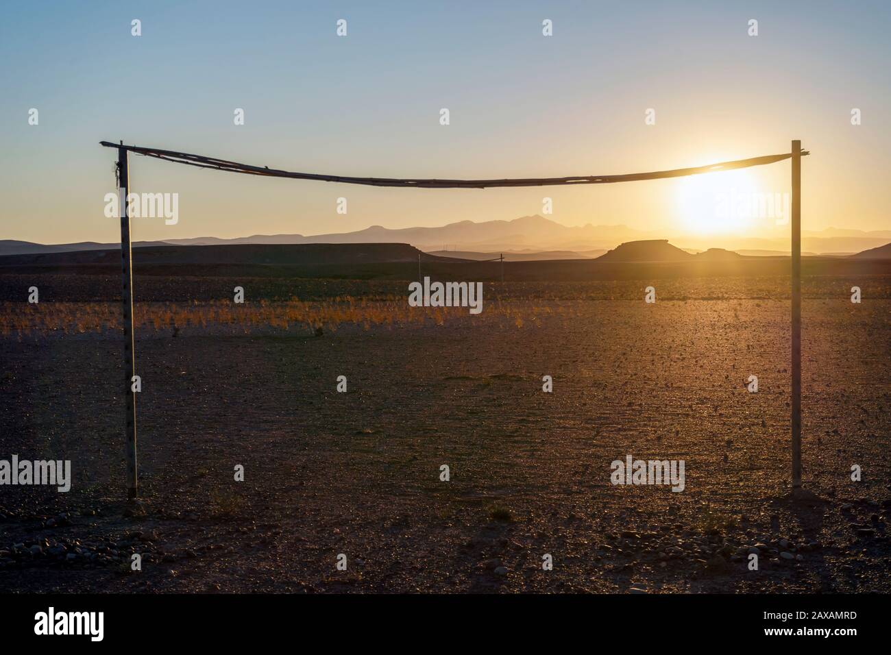 Playing soccer in desert dust beneath the Rifa-Fort, Rifa, Kingdom