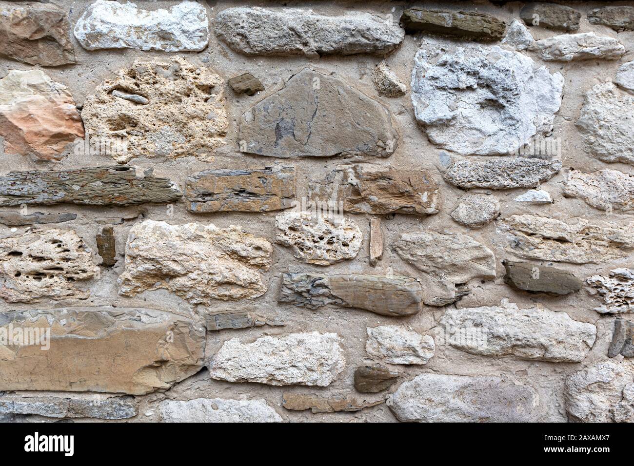 Old stone wall background texture close up Stock Photo - Alamy
