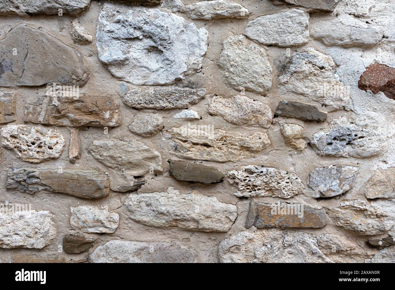 Old stone wall background texture close up Stock Photo - Alamy