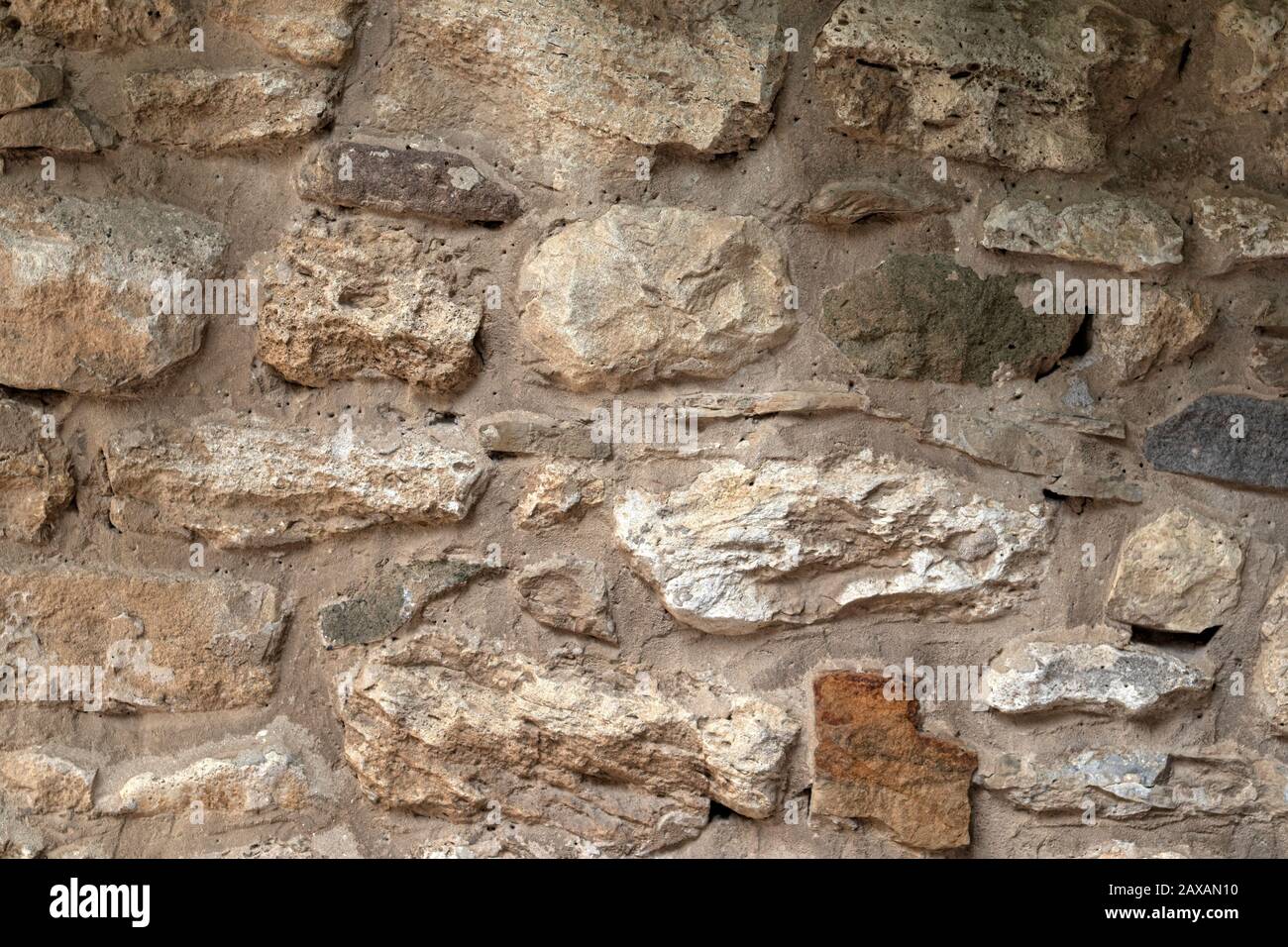 Old stone wall background texture close up Stock Photo - Alamy