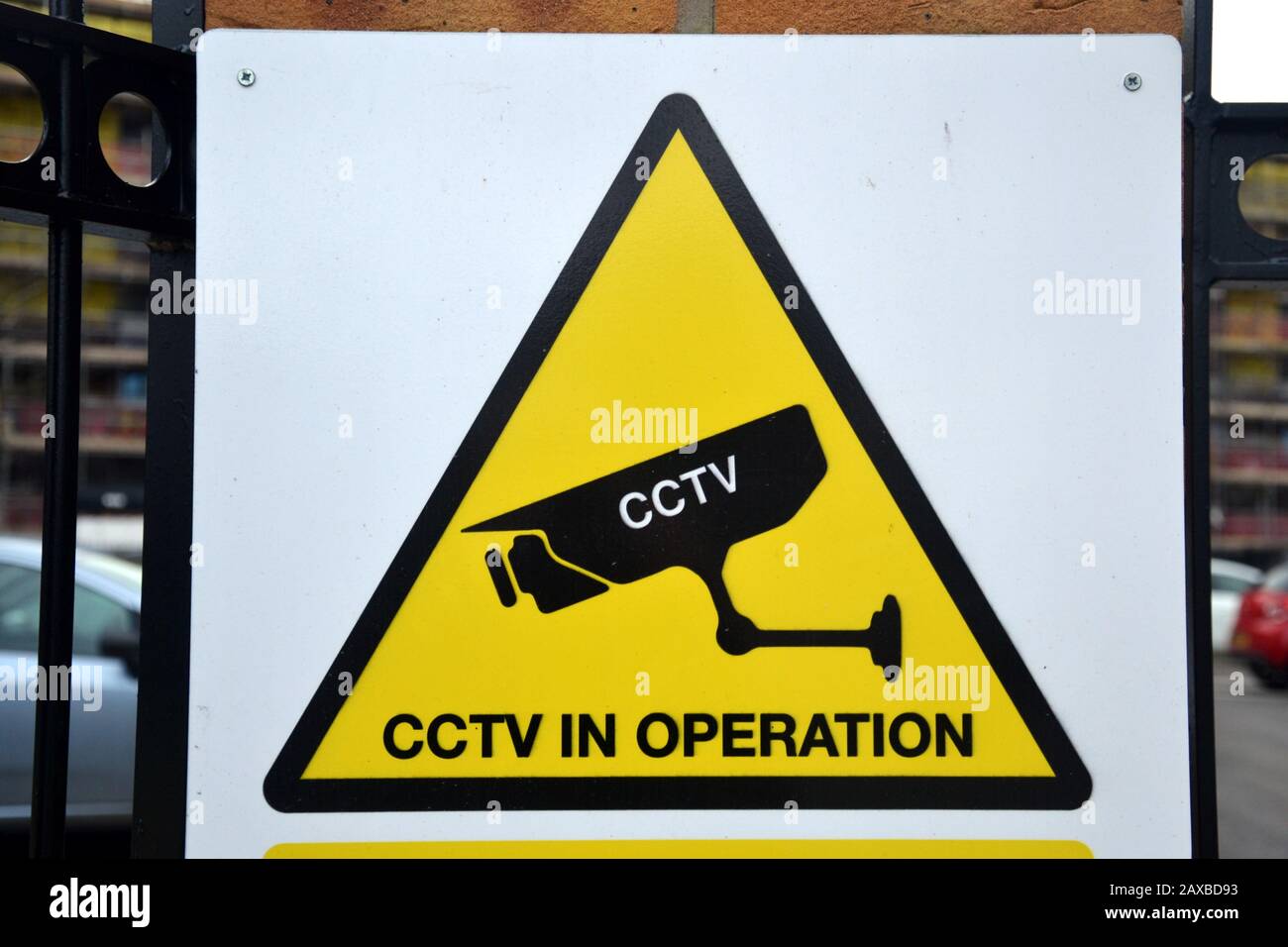 A sign to inform people that closed circuit television is in operation outside a car park in Manchester, uk, in order to deter crime Stock Photo