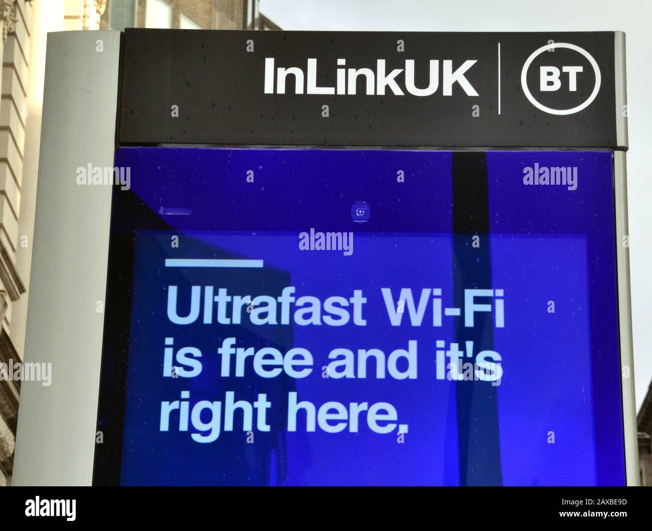 A BT InLinkUK point in Manchester, uk, providing free public Wi-Fi, phone calls, device charging and a tablet for access to city services. Stock Photo