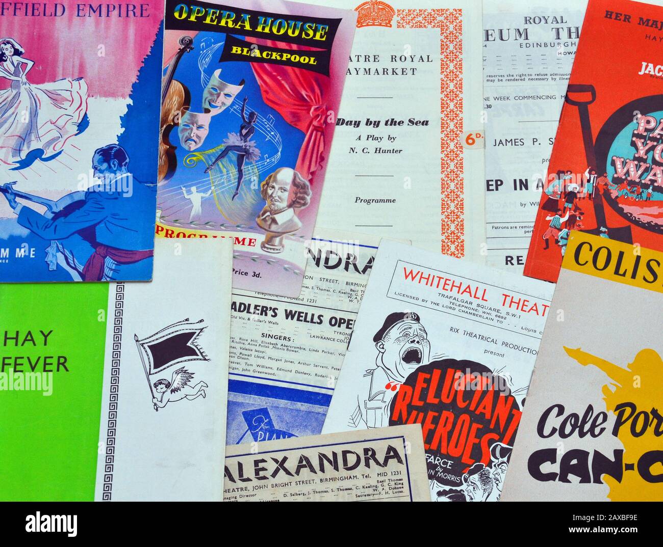 An overhead view of the covers of a collection of old uk theatre programmes, mainly from the 1950's Stock Photo