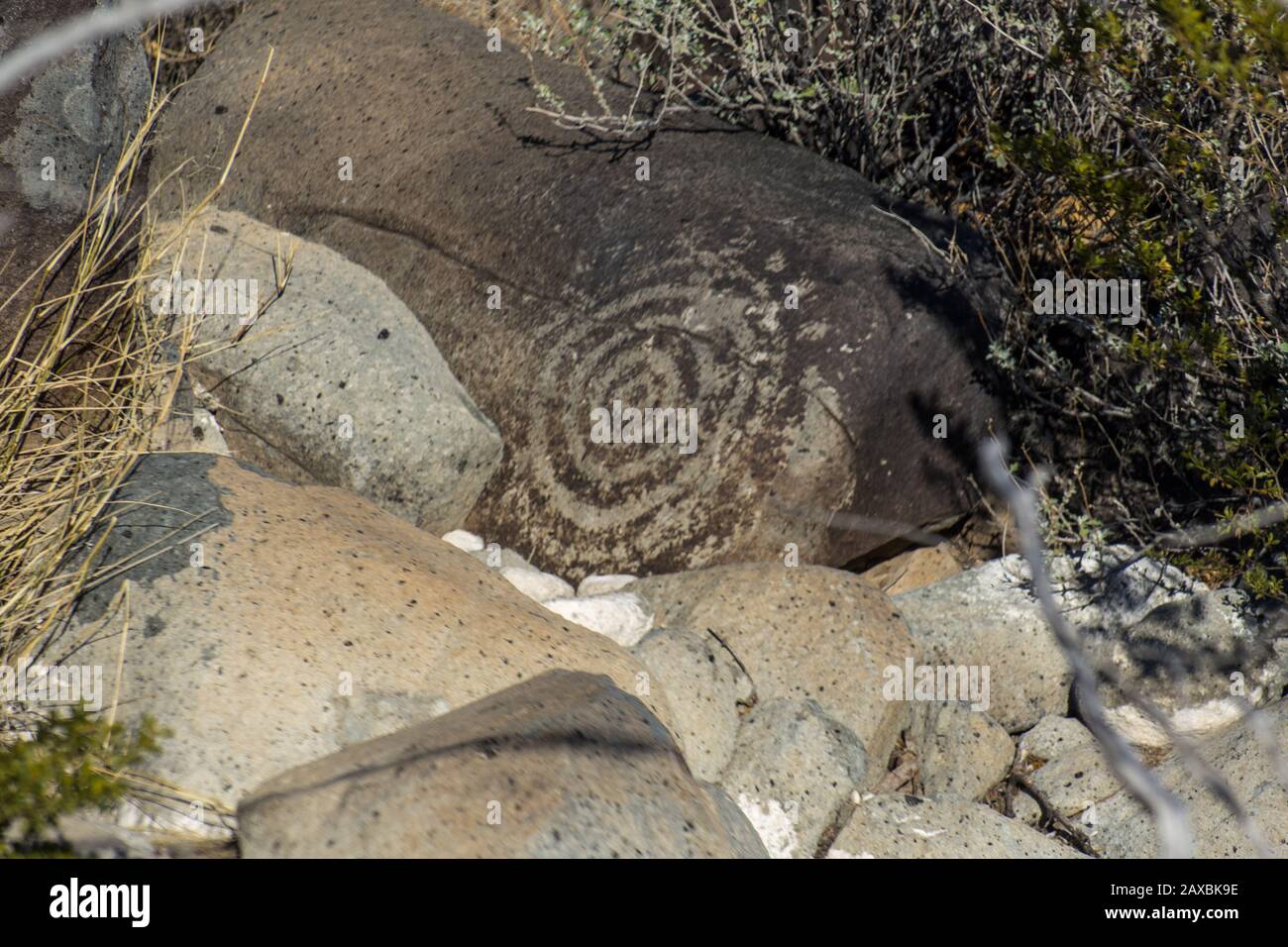 A 600 year old geometric shape carved into basalt by the Jornada Mogollon peoples of New Mexico. Stock Photo