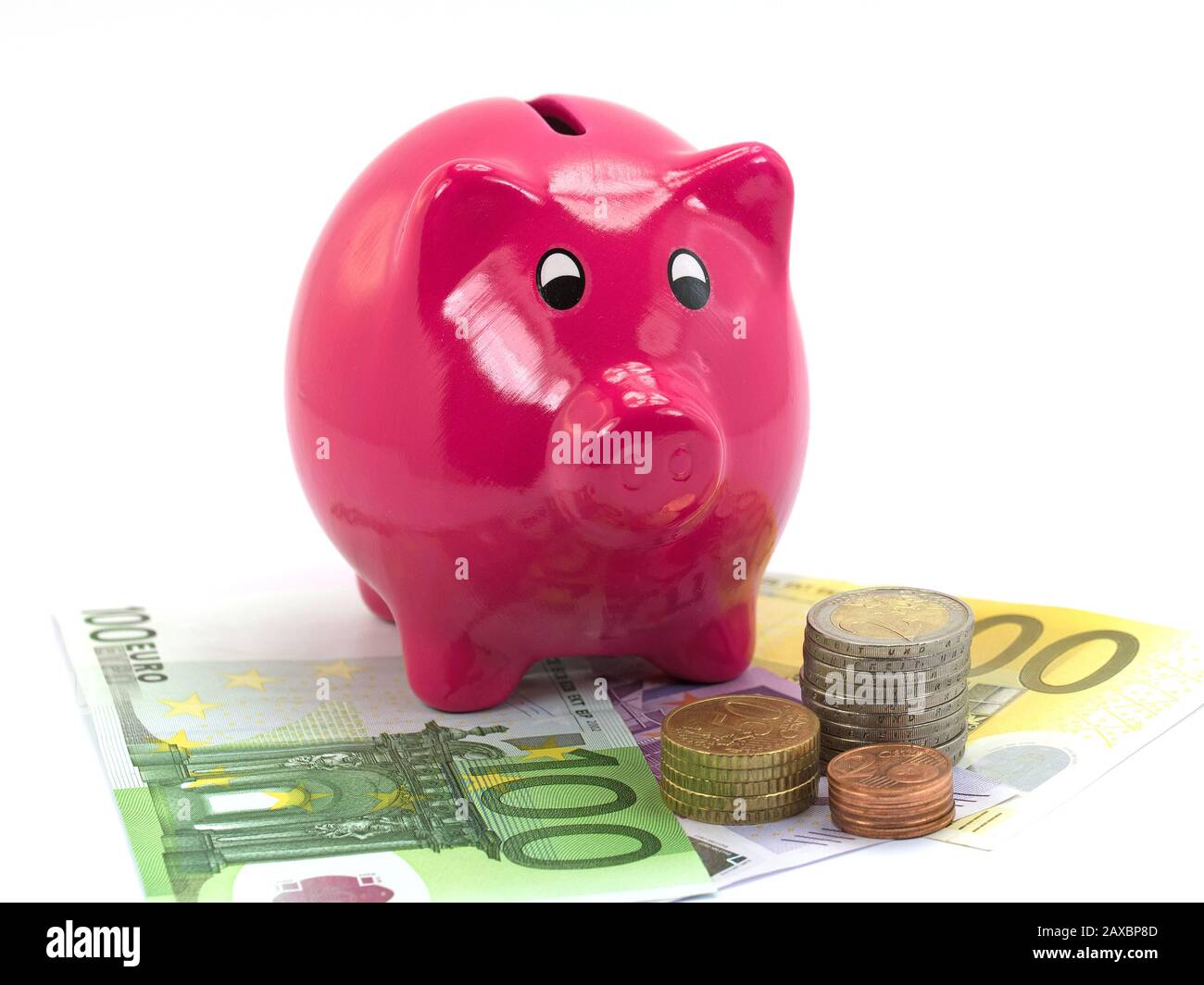 Piggy bank and money against white background Stock Photo - Alamy