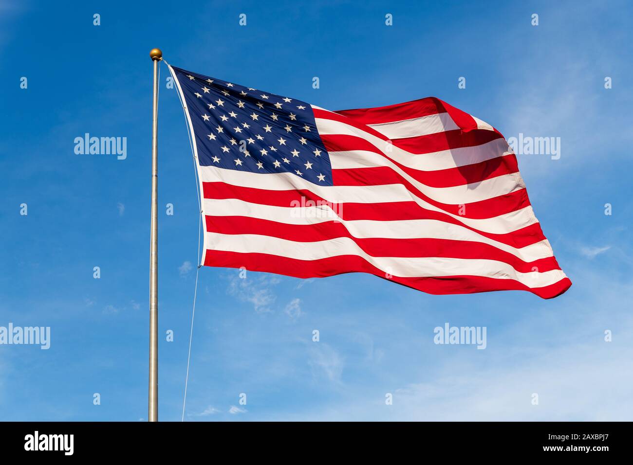 Demon Play Surprisingly hotel American Flag waving in the wind, with beautiful red white and blue colors  Stock Photo - Alamy