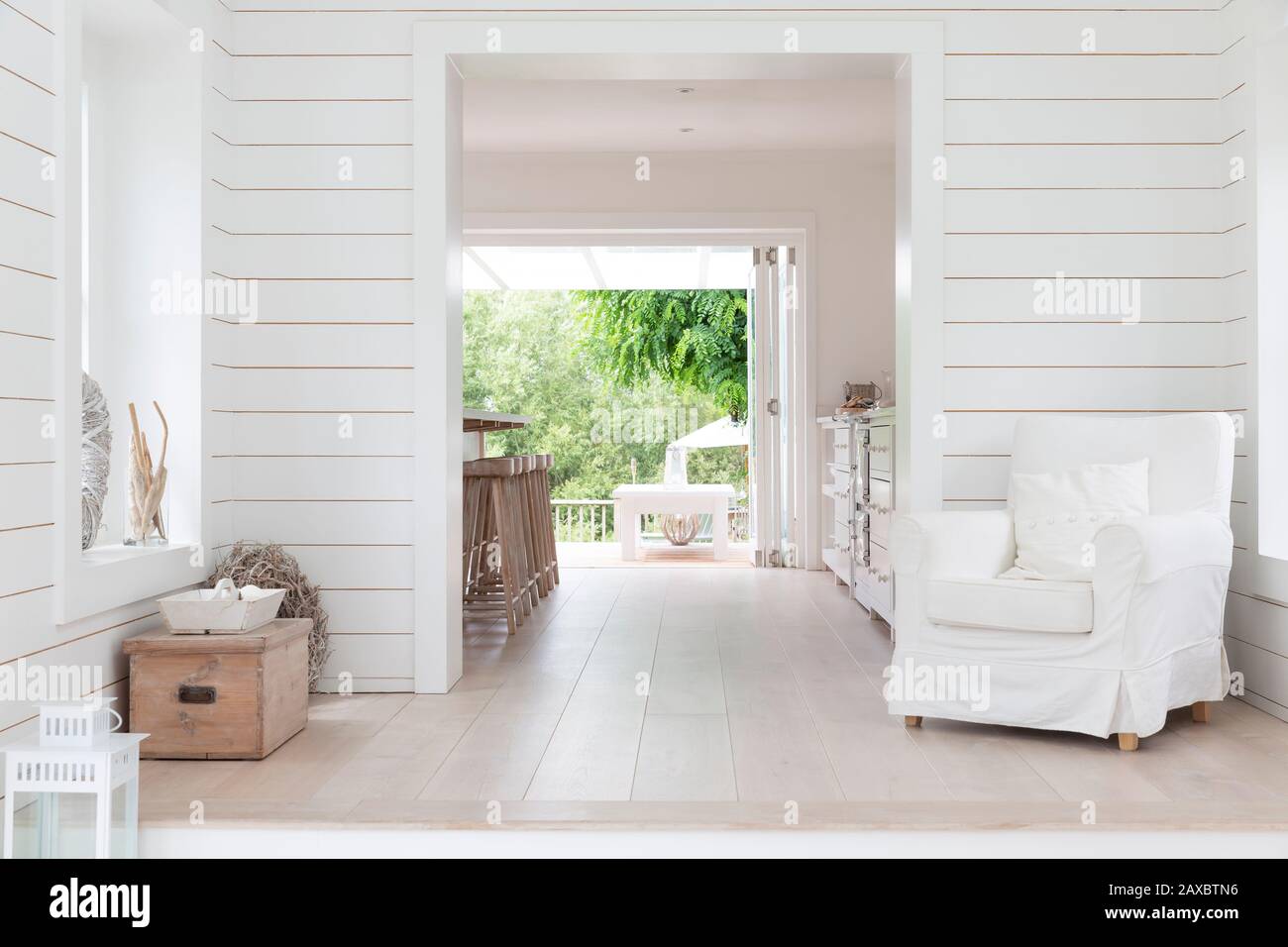 White wood shiplap home showcase interior sitting area Stock Photo