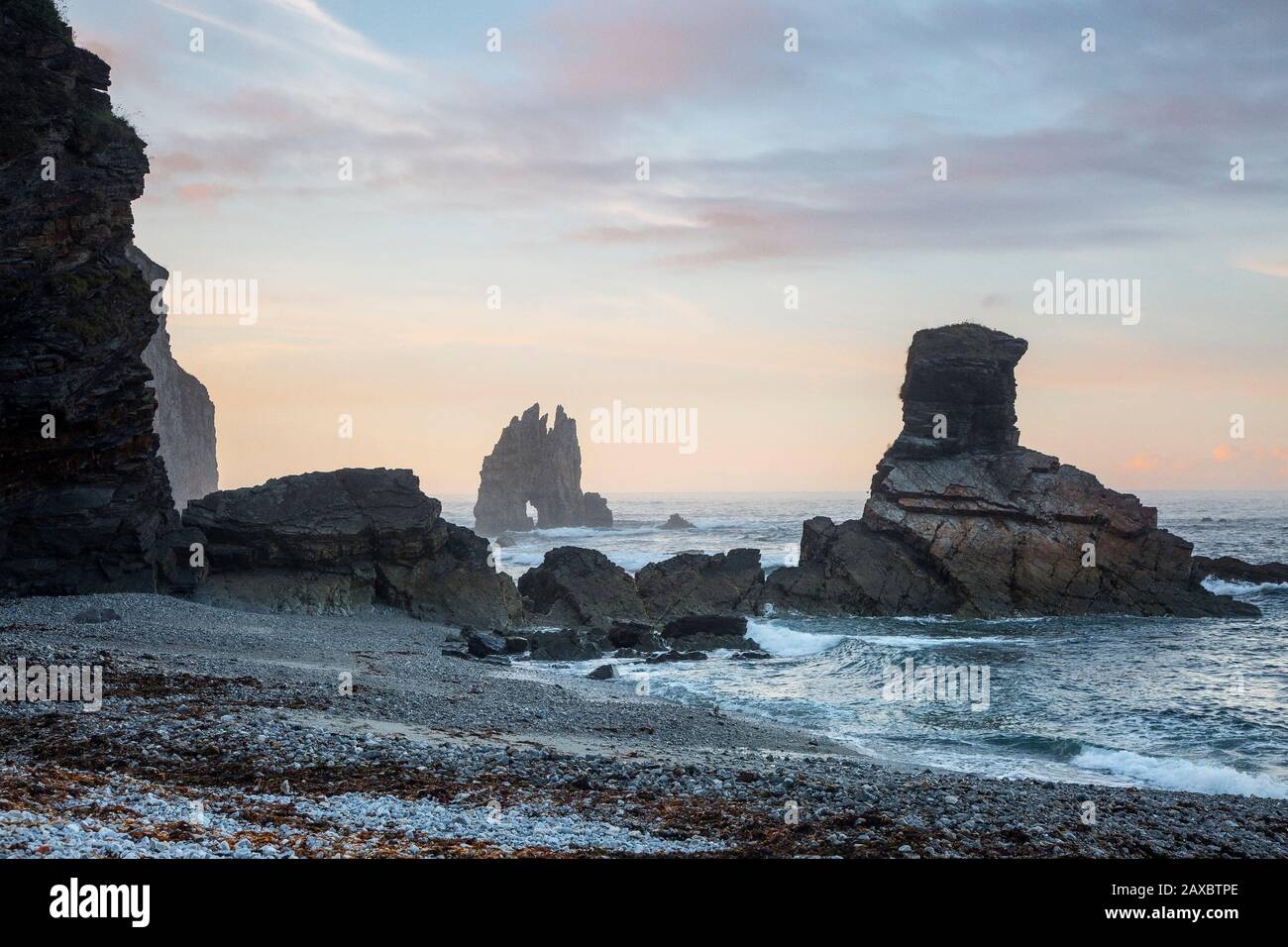 Rock formations in ocean Portizuela Beach Asturias Spain Stock Photo