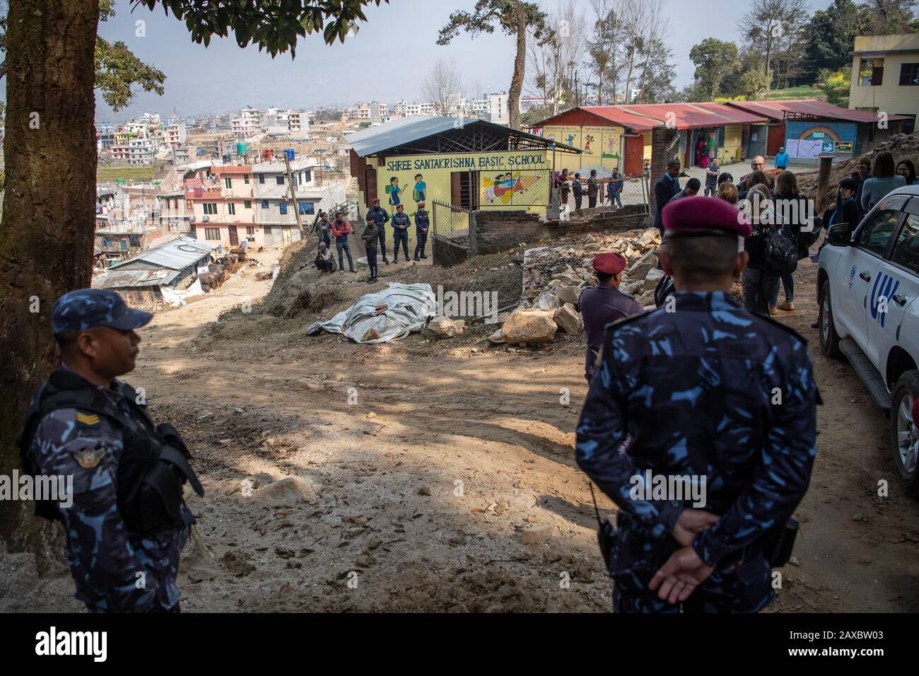 Nepal. 04th Feb, 2020. Police officers are standing in front of a school that was rebuilt after the earthquake. About five years after the severe earthquake in Nepal, Büdenbender travels to the Himalayan country as patroness of Unicef. Credit: Sina Schuldt/dpa/Alamy Live News Stock Photo